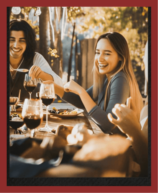 Elegant outdoor dining with friends at Vanalondon, featuring fine wine and delicious food in a cozy setting.