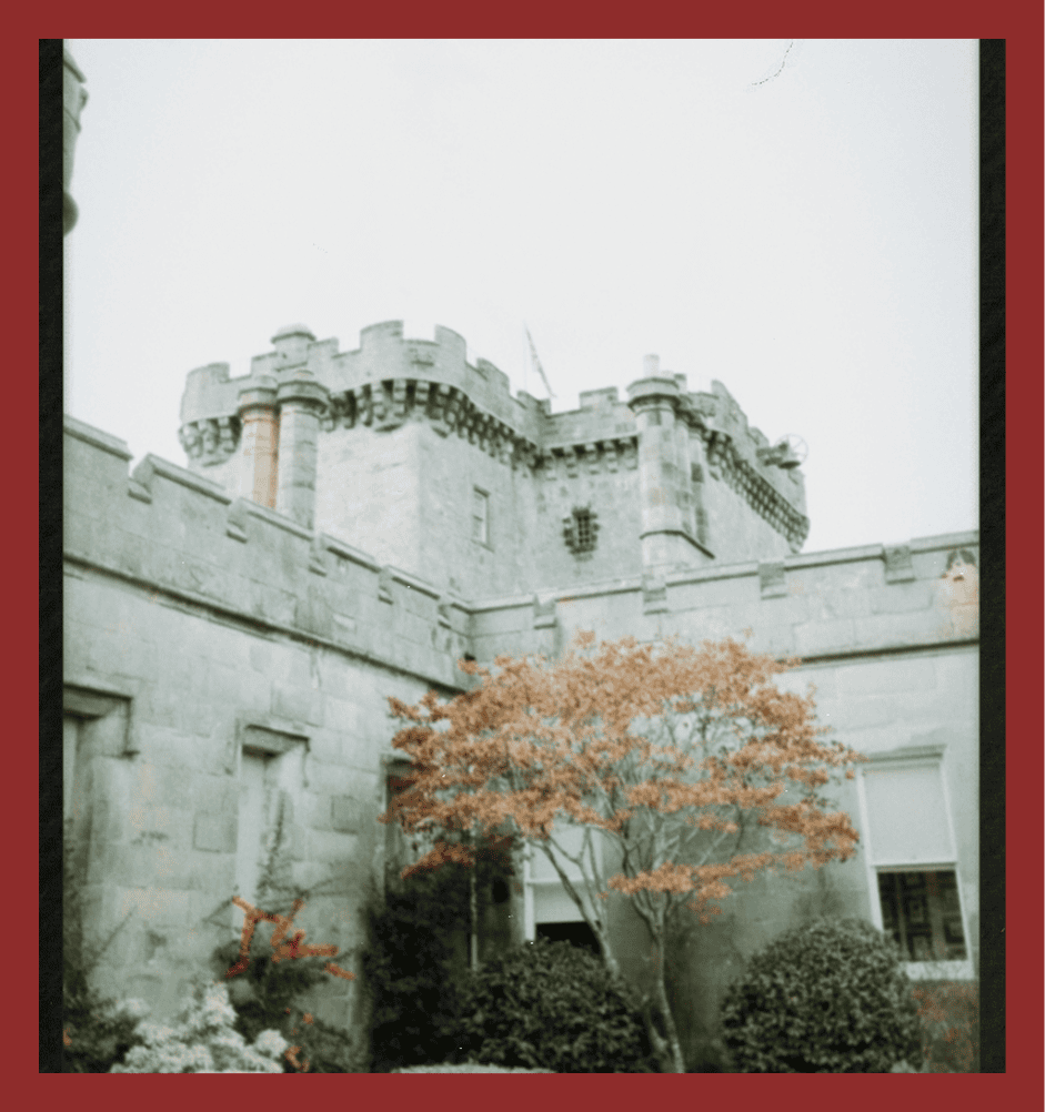Old castle with stone walls and turrets in London, UK.